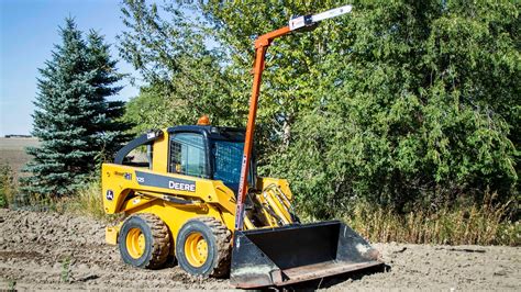 skid steer chainsaw attachment|hydraulic chainsaw for bucket truck.